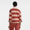 Crema/Coral – Polo de jersey a rayas