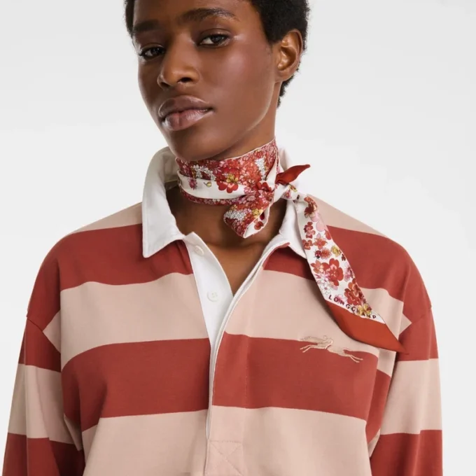 Crema/Coral – Polo de jersey a rayas