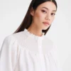 Crudo – Blusa con velo fruncido